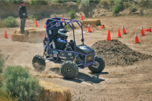 Image of Baja vehicle on the dirt track at competition